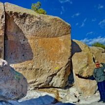 Alfred with petroglyphs in the Tsankawi prehistoric site of the Bandelier National Monument